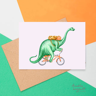 A green brontosaurus wearing a backpack riding a bike