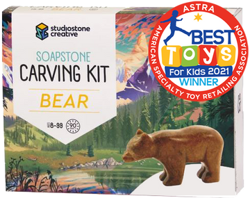 Bear Soapstone Carving Kit - Bear soapstone carving kit box with carved brown bear figure and Canadian wilderness backdrop, handmade unique gift.