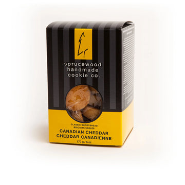 Canadian Cheddar Shortbread Cookies | Sprucewood Handmade Cookie Co - Black and yellow box of Canadian Cheddar Shortbread Cookies by Sprucewood Handmade Cookie Co, gift-ready and unique.