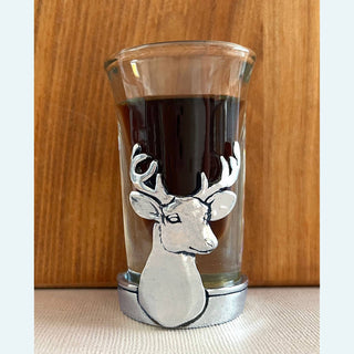 Shot glass with a white deer head on the front