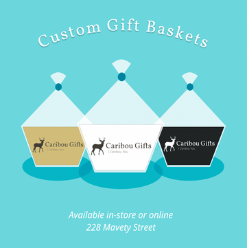 Custom Gift Basket - Three uniquely shaped gift baskets in beige, white, and black with Caribou Gifts logo on pastel blue background.