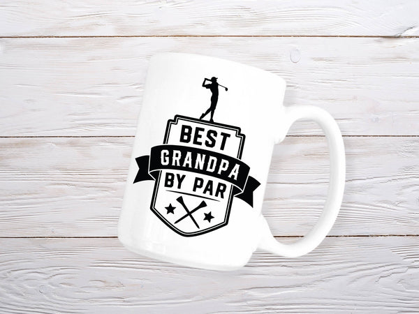 A black and white mug with a golfer and the words 