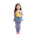 A kid holding the LEGO Banana Guy Plush Minifigure