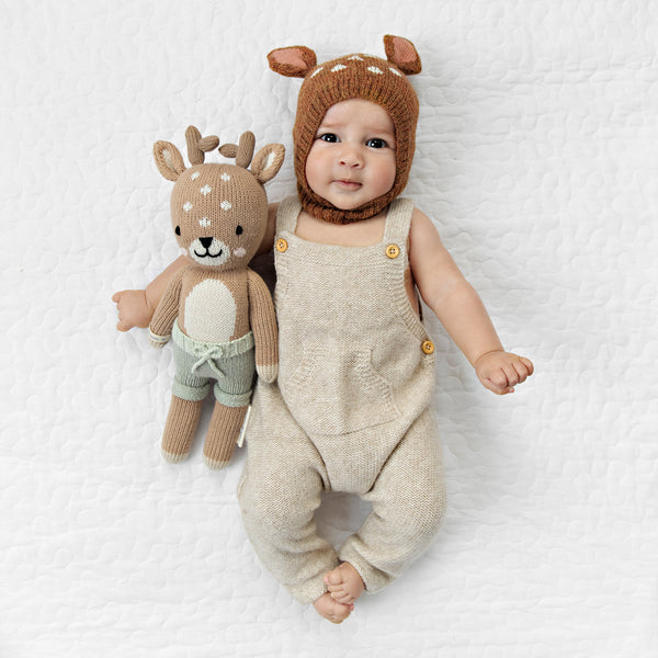A small fawn stuffy with a baby