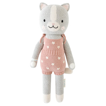 Daisy the Kitten - Handmade grey and white knitted kitten doll wearing pink floral romper, unique Canadian gift for babies.