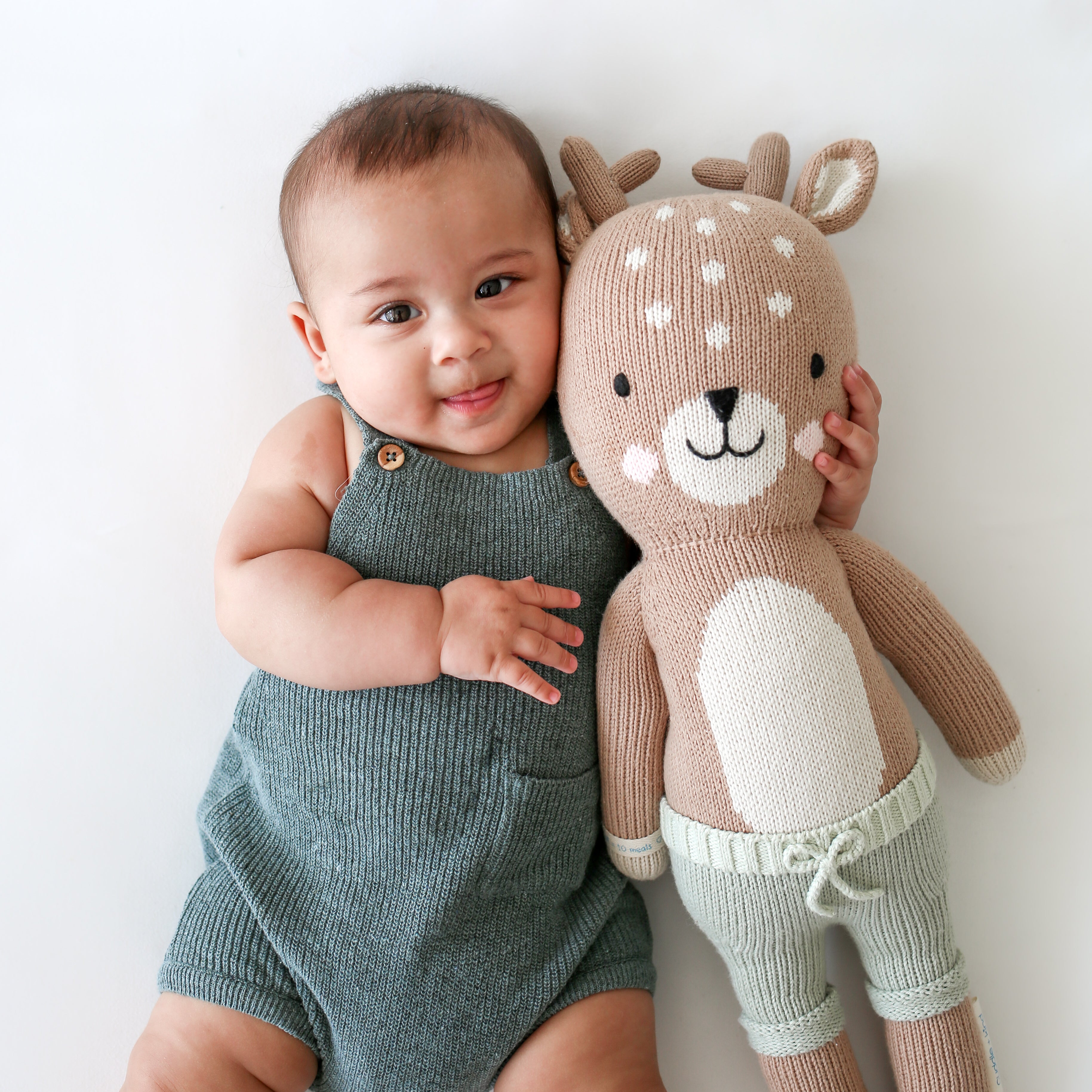 A fawn stuffy with a baby