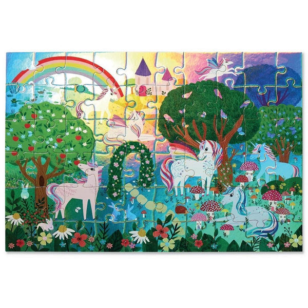 7 unicorns sit in a forest surrounded by mushrooms, trees and flowers. In the background there is a castle, rainbow and a pegasus flying over trees