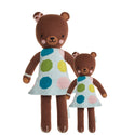 2 different sized brown bear stuffies wearing a polka dot dress