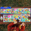 An overhead shot of a child doing a puzzle consisting of animals and their corresponding letter of the alphabet above them