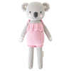 A koala stuffy wearing a pink dress