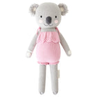 A koala stuffy wearing a pink dress
