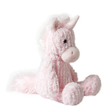 Pink unicorn plushy sitting from the side