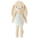 Bunny plush wearing light blue overalls with a mini bunny in the pocket