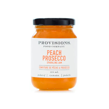 Peach & Prosecco Jam - Handmade Canadian Peach & Prosecco sparkling jam in clear glass jar, unique gourmet gift.